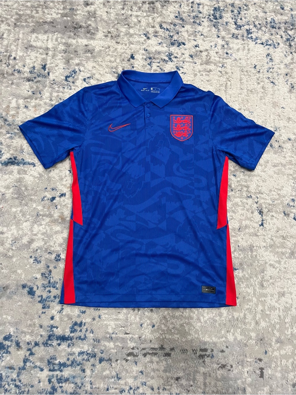 Nike England World Cup blue polo shirt with red side panels